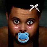 The Weeknd Shares Cute Baby Photo of Himself with a Santa Hat on & It’s So Adorable