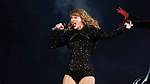 Unzips Bodysuit During Concert – Hollywood Life